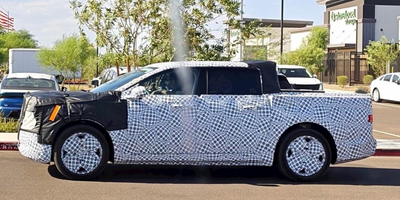 Side profile of the camouflaged Ford Fathom prototype spotted testing in Arizona