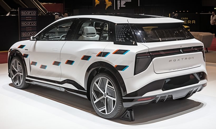 Rear view of the Foxtron Model B electric crossover at an auto show