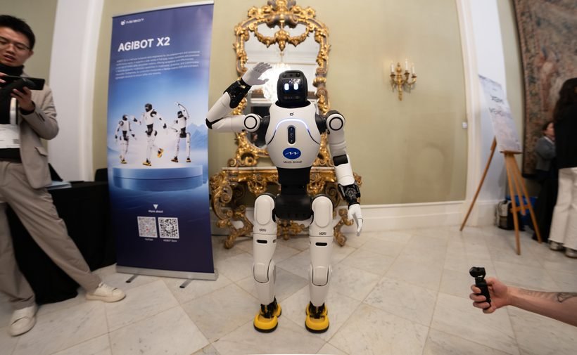 Agibot X2 humanoid robot waving at MWC 2026