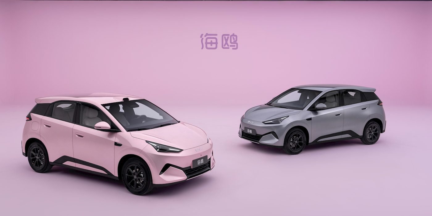 Second-generation BYD Seagull electric hatchbacks in pink and grey studio photos