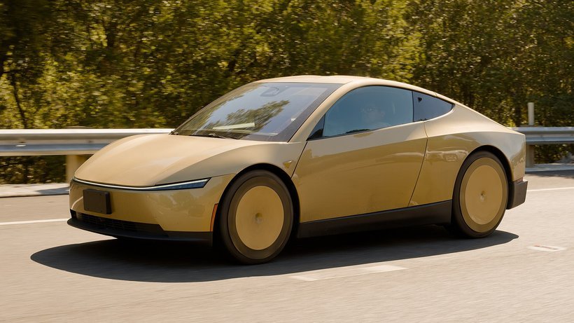 A Tesla Cybercab test vehicle on a California highway — Cybercabs are expected to start public rides in Dallas in November 2026