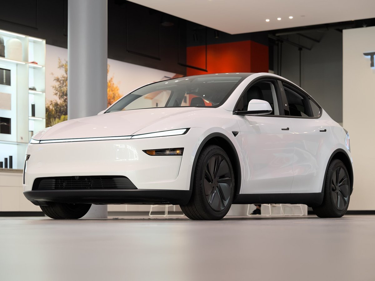 A 2025 Tesla Model Y — the same kind of driverless Model Y now offering free first rides in Houston and Dallas
