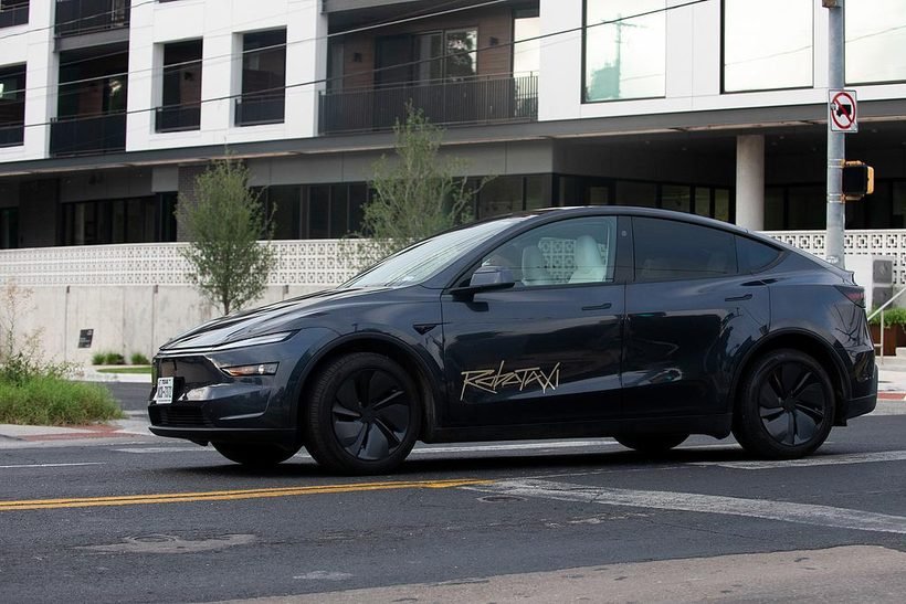 A Robotaxi-branded Model Y on the street